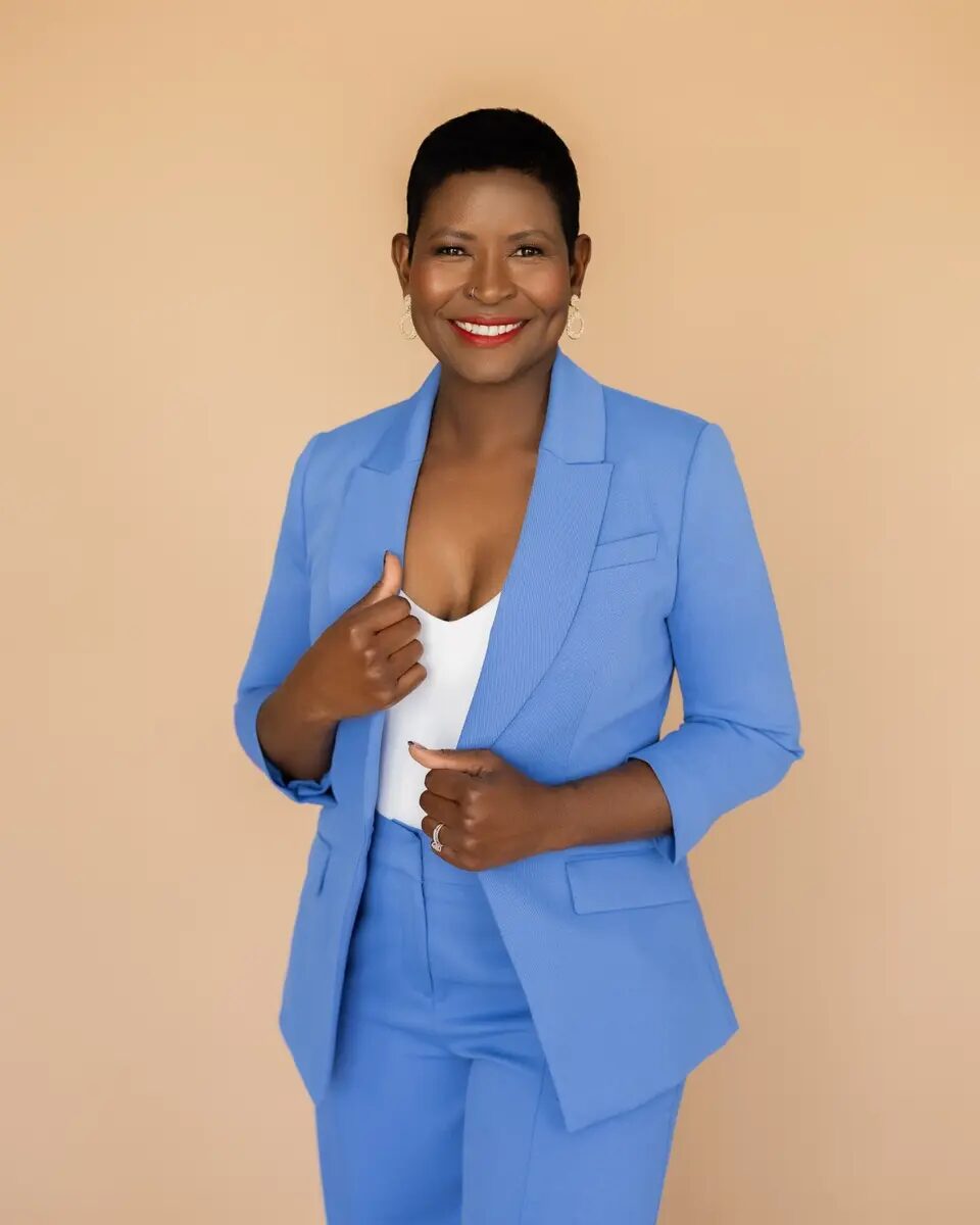 Sarah Kamoto wearing a blue suit